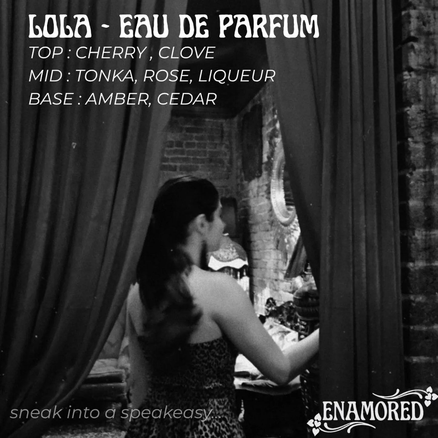 Black and white album-style cover art for 'Lola - Eau De Parfum' with white text listing fragrance notes and an image of a woman seen from behind standing in front of draped curtains. The Enamored logo appears in the bottom right corner.