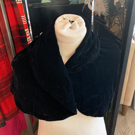 Black velvet bolero capelet wrap with structured collar and cream satin lining