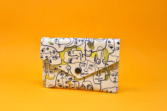Many Faces Popper Purse: Cream